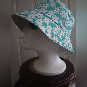 Bucket Hat with floral designs.. (never worn)